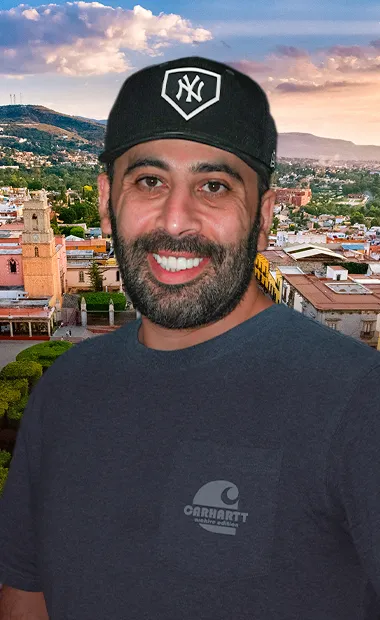 mid age man showing natural smile with a 3 on 6 prosthesis restoration