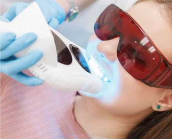 Smiling patient with restored confidence after procedure with dental implants