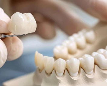 Smiling patient with restored confidence after procedure with dental implants