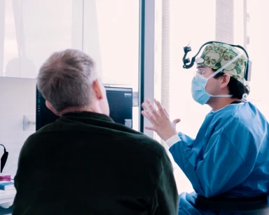 dental specialist explaining the procedure to his patient