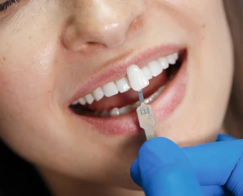 Smiling patient with restored confidence after procedure with dental implants