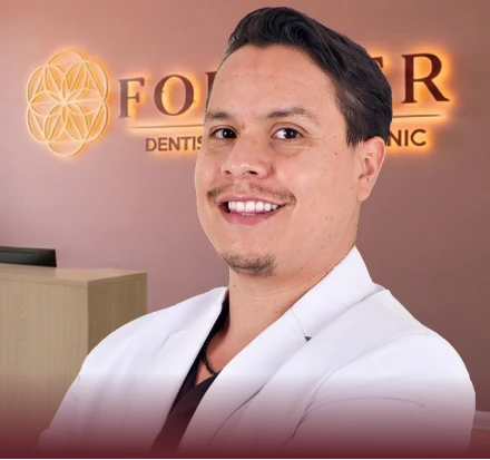 Joyful woman in her 30s with a brilliant, perfect Hollywood smile achieved through cosmetic dental veneers.