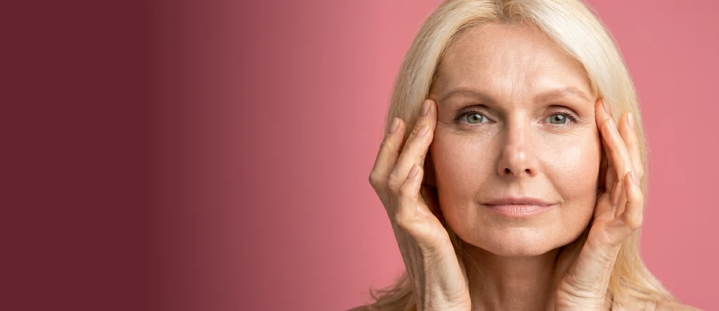 Woman with refined facial contours against neutral background