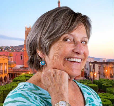 gray gaired woman showing-off a perfect smile with joy