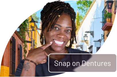 Patient showing how snap-on dentures attach securely to dental implants for improved comfort and function