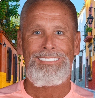 Smiling patient after receiving zygomatic implants from a dentist in San Miguel de Allende.