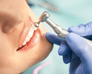 Smiling patient with restored confidence after procedure with dental implants